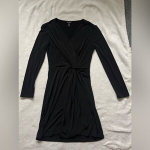 Short black PXS dress by Daisy Fuentes